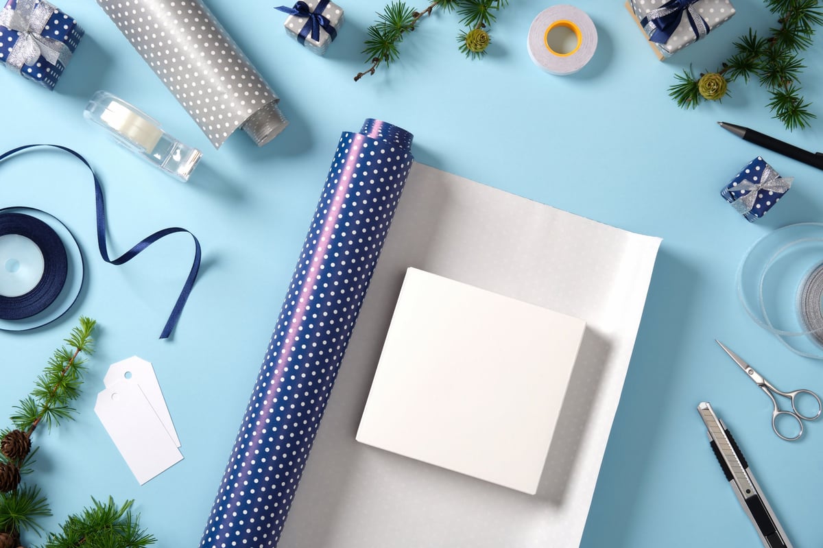 Wrapped gift box with ribbon and wrapping paper